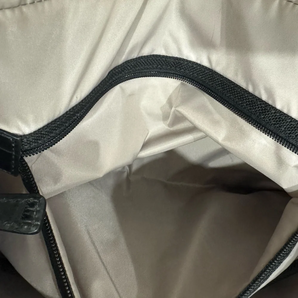 Tumi Travel Black Briefcase with Leather Finish and Metal Accents